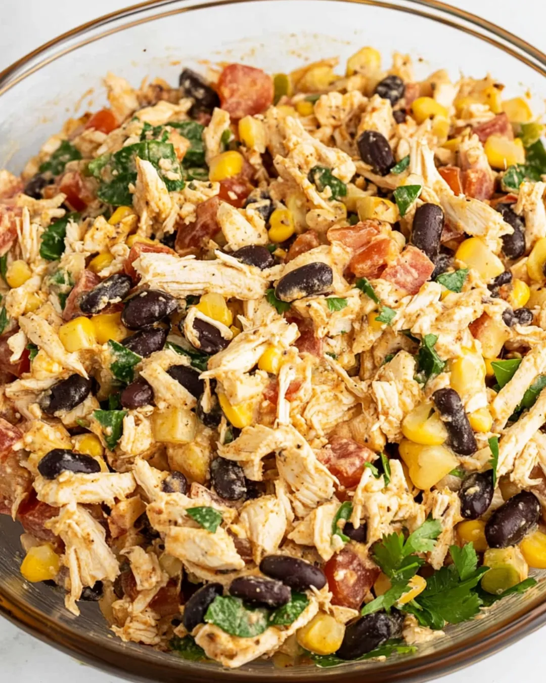 Quick Southwest Chicken Salad with fresh veggies, black beans, and a creamy dressing.