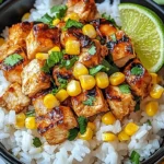 Street Corn Chicken Rice Bowl with grilled chicken, roasted corn, and flavorful toppings in a bowl.
