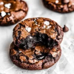 Fudgy chewy brookies with a rich brownie and chocolate chip cookie layer, cut into squares.