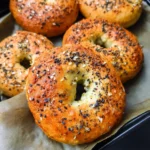 Air Fryer Protein Bagels, golden and crispy, with a slight sheen from the air frying process.