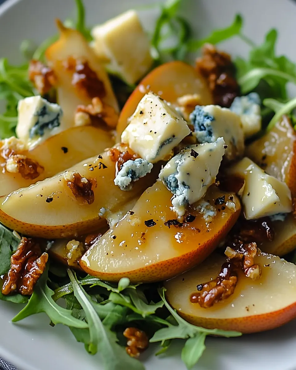 Served salad with blue cheese and warm pears