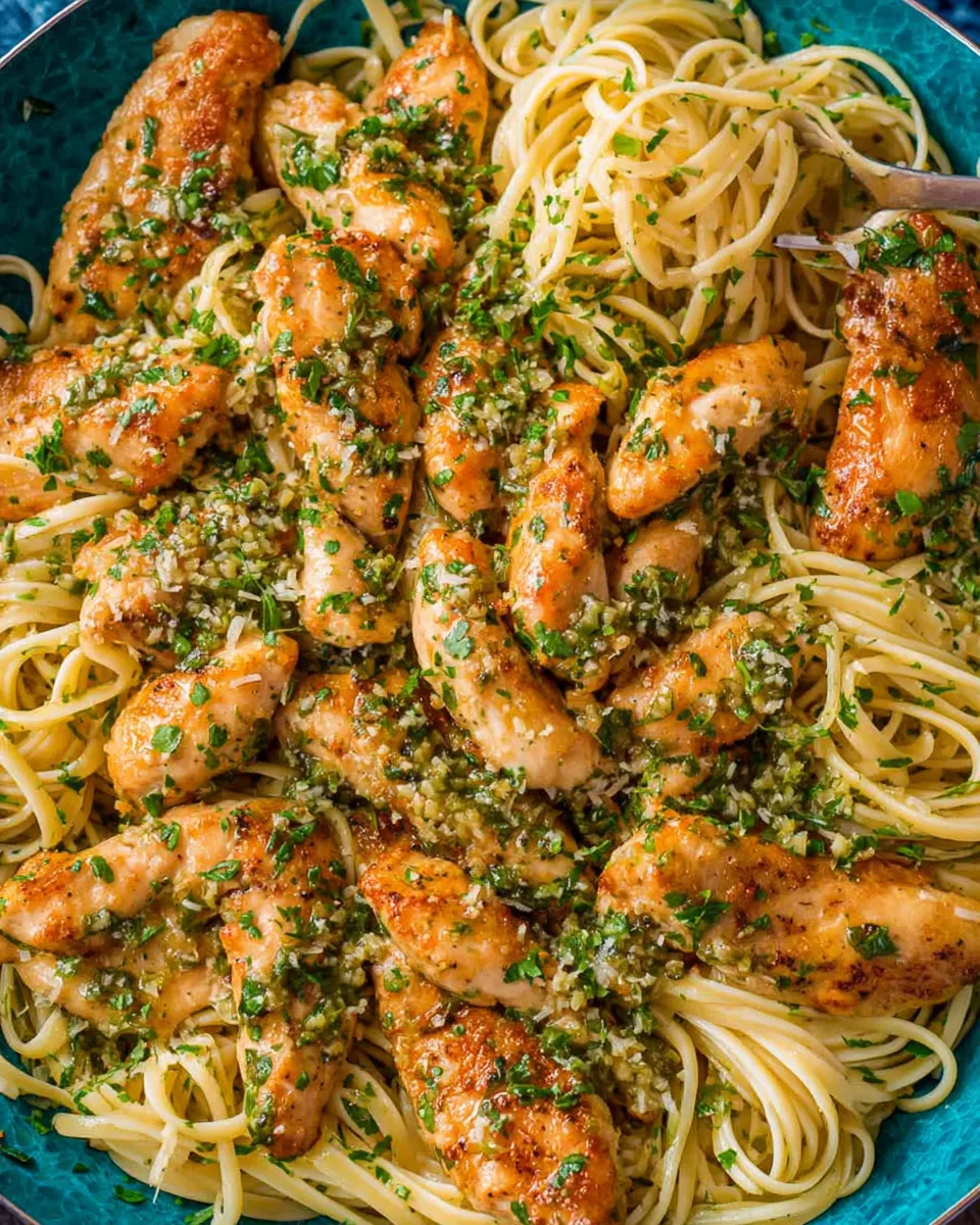Chicken scampi sauce reducing in skillet