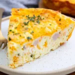 Cottage Cheese Crustless Quiche baked golden brown, sliced and ready to serve