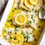 Baked Lemon-Garlic Cod with Butter Sauce plated