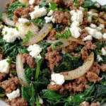Ground Beef and Spinach Skillet with Feta in cast iron pan