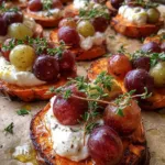Sweet potato rounds with burrata, honey and roasted grapes