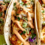 Zesty fish tacos with spicy sriracha lime sauce